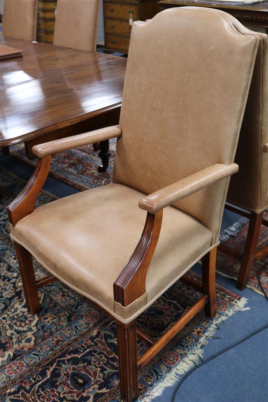 A set of 6 tan leather dining chairs